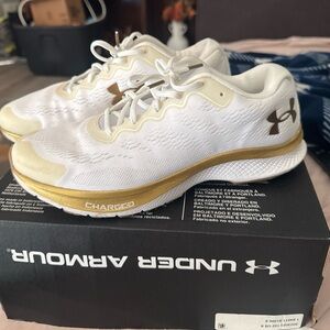 Under Armour White and Gold Athletic Sneakers lightly used (worn once)